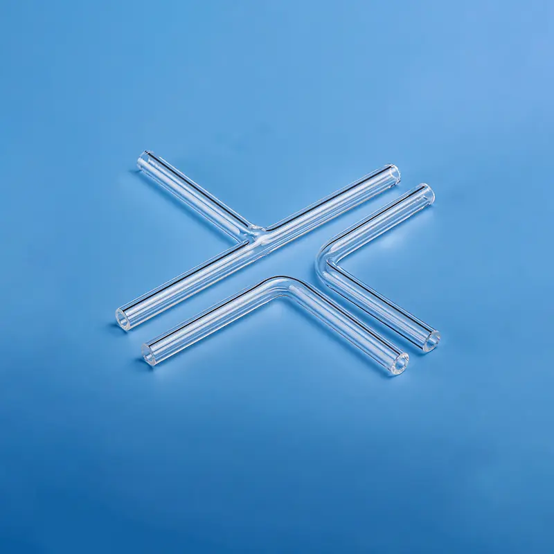 Examples of L-shaped and angled clear quartz tubes for Laboratory setups.