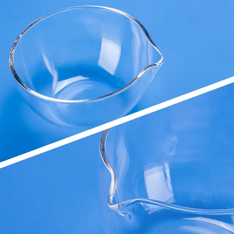 Close-up view of a clear quartz evaporating dish highlighting the pouring spout detail.