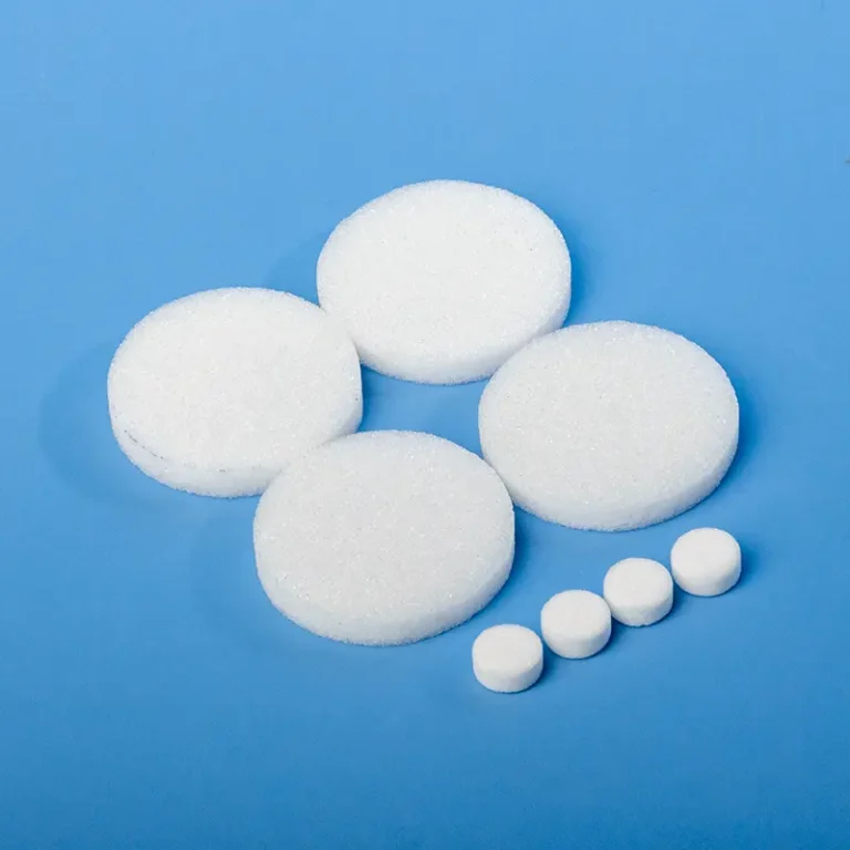 Assortment of white quartz fritted discs in various diameters, shown on a blue background