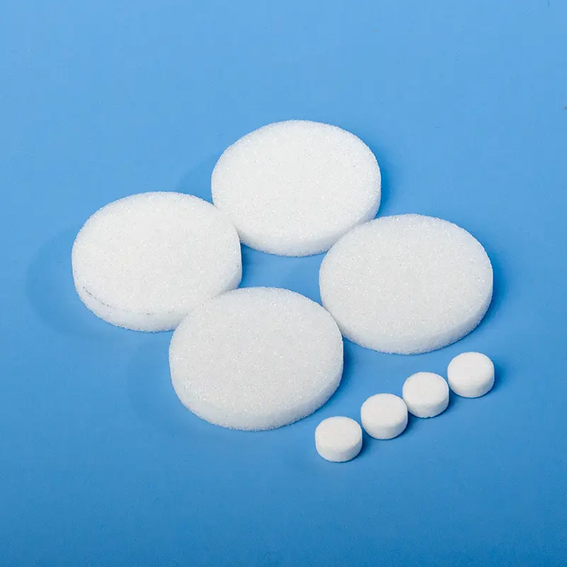 Assortment of white quartz fritted discs in various diameters, shown on a blue background