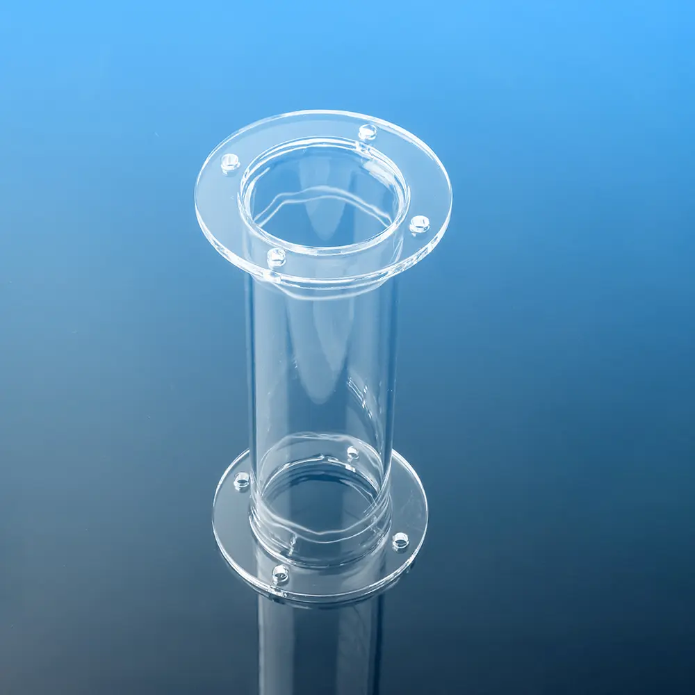 Upright clear double flanged quartz tube with polished flanges on both ends, shown against a blue gradient background