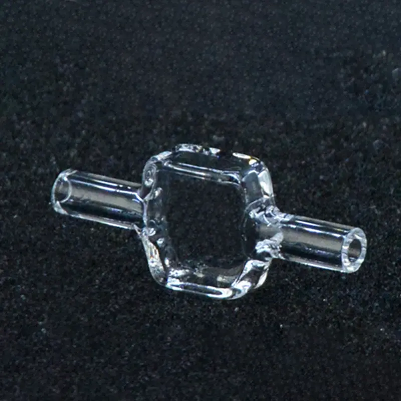 Clear quartz fluorescence flow cell, 10mm pathlength, with inlet and outlet tubes, on a dark background