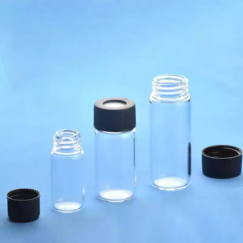 Three sizes of clear quartz glass vials displayed with corresponding black screw caps