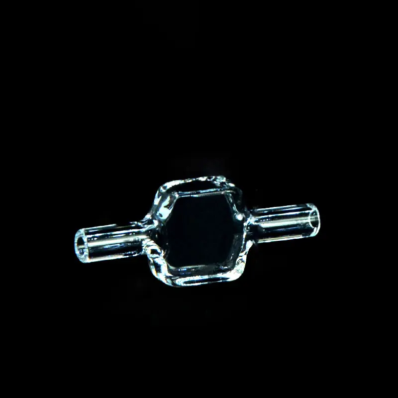 High clarity quartz fluorescence flow cell with tubing connections, shown against a stark black background
