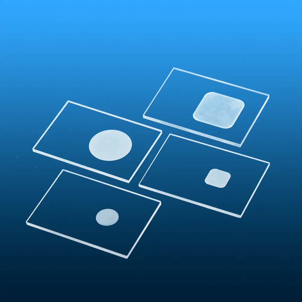 Assortment of clear quartz glass sample holders for XRD analysis, featuring various round and square well configurations