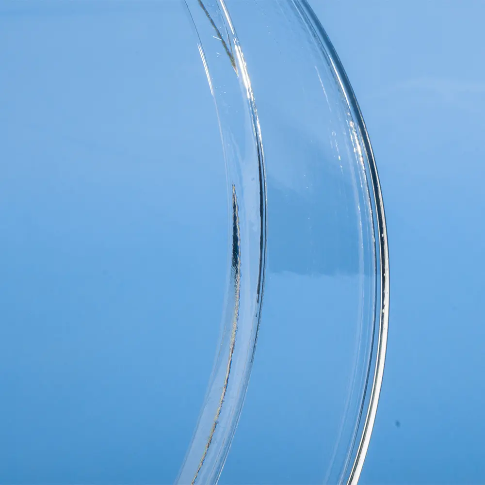 Detailed close-up view of the inner surface and polished rim of a clear quartz ring