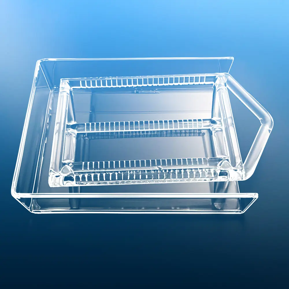 Top-angle view showing the parallel slots of the quartz boat within its carrier tray.