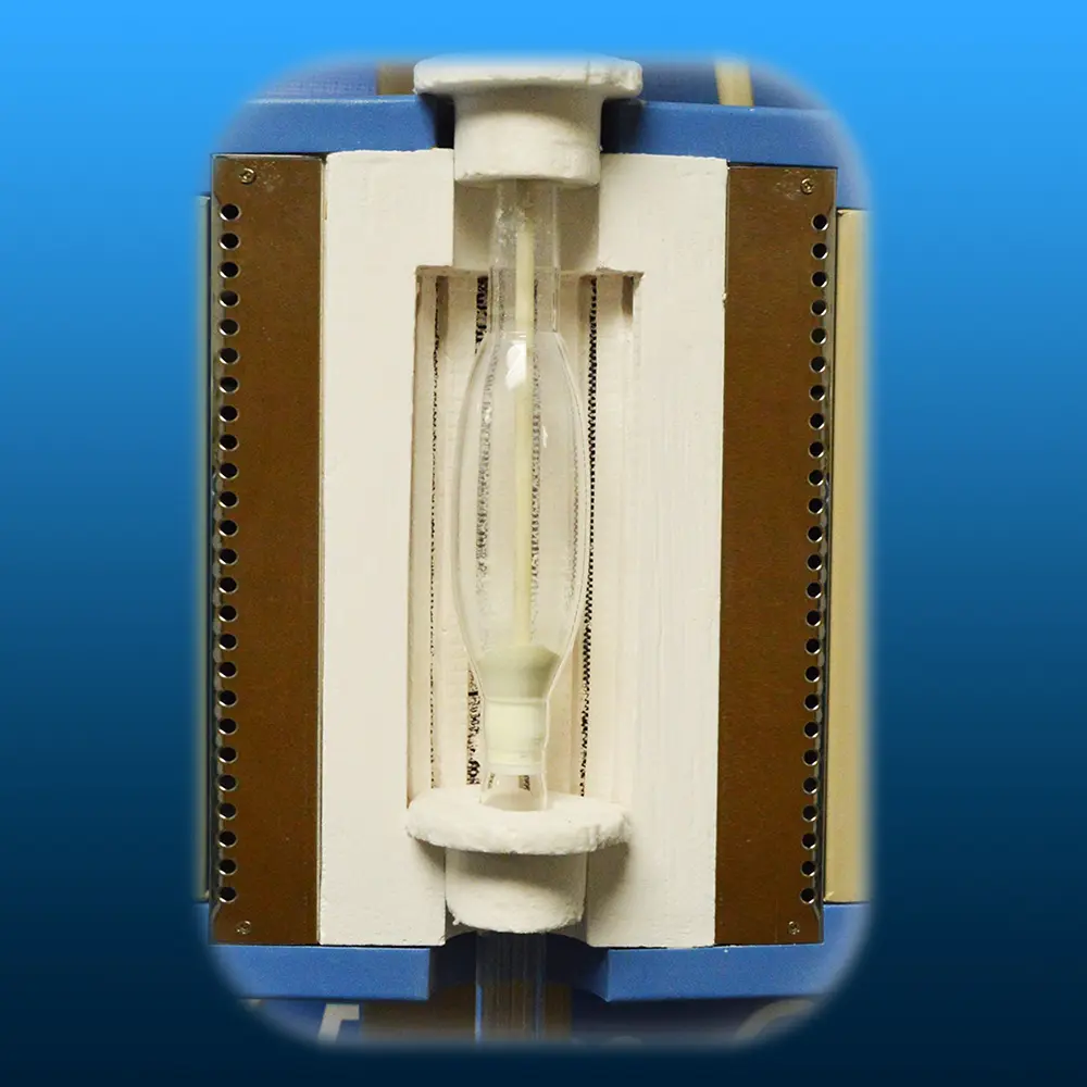 Aoxin quartz process tube with fritted disc installed inside a vertical tube furnace section