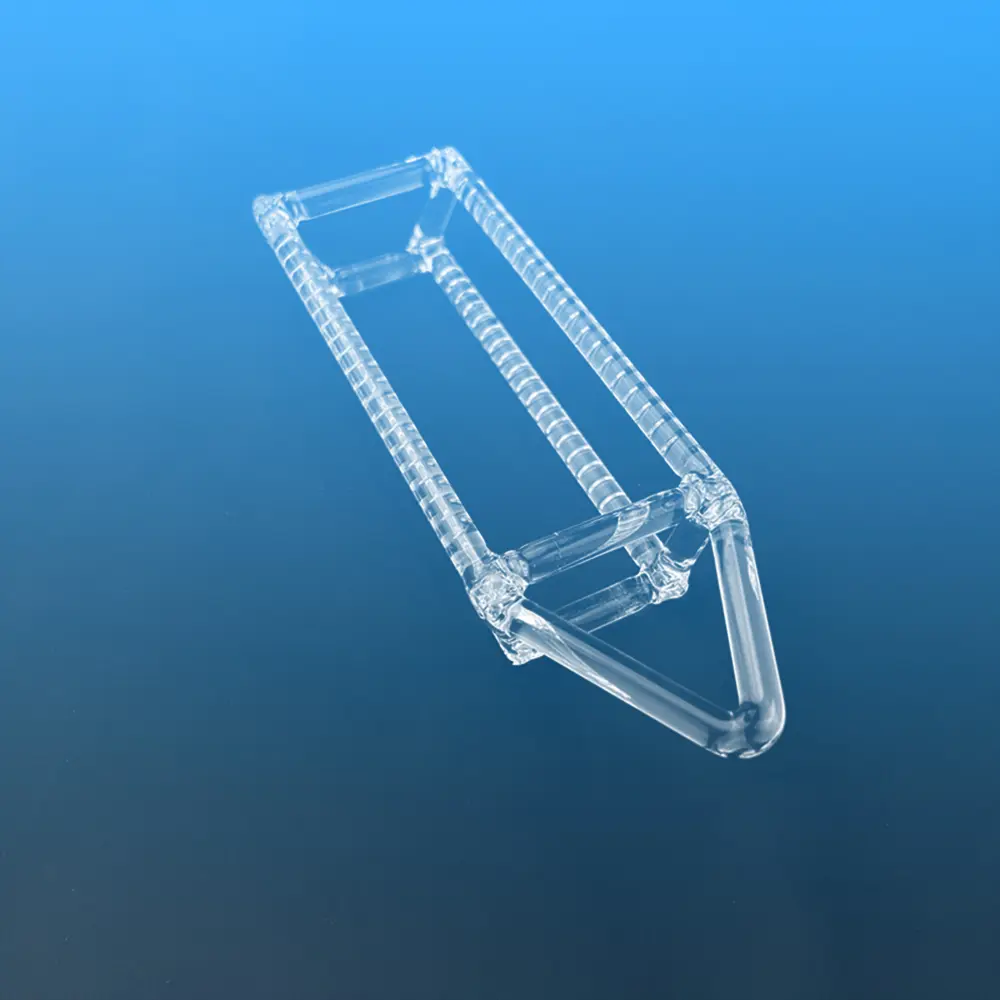 High-angle perspective of a slotted quartz wafer carrier boat, emphasizing the handle design and wafer slots